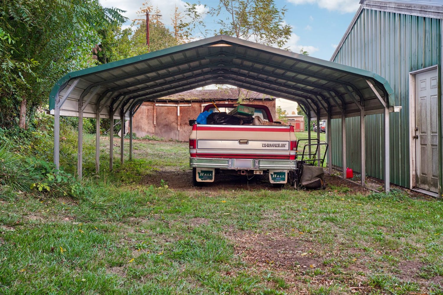 Comment fermer un carport pour l’hiver : bâches, parois et astuces